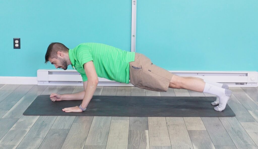 Inbetween the elbow and high push up postion